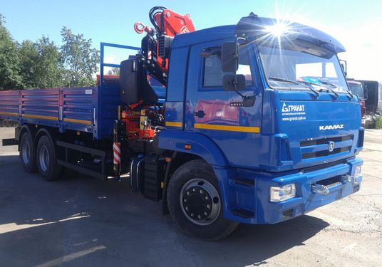 Бортовой КАМАЗ 65117-3010-48 с КМУ Fassi 215A.0.24