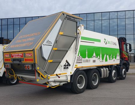 Мусоровоз с задней загрузкой ALFANORD KGH25-KP с откидной мусороприёмной ванной на базе КАМАЗ-65951
